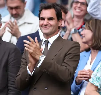 Jannik Sinner celebrates after defending his Wimbledon men's singles title in 2026.