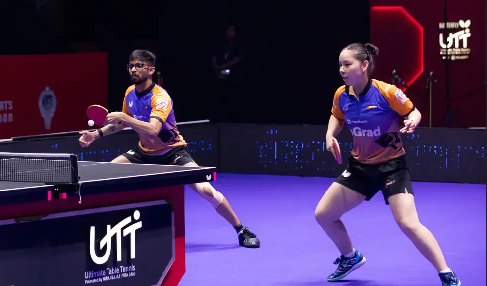 U Mumba TT players celebrate their record-breaking victory over UP Prometheans in Butterfly UTT Season 7.