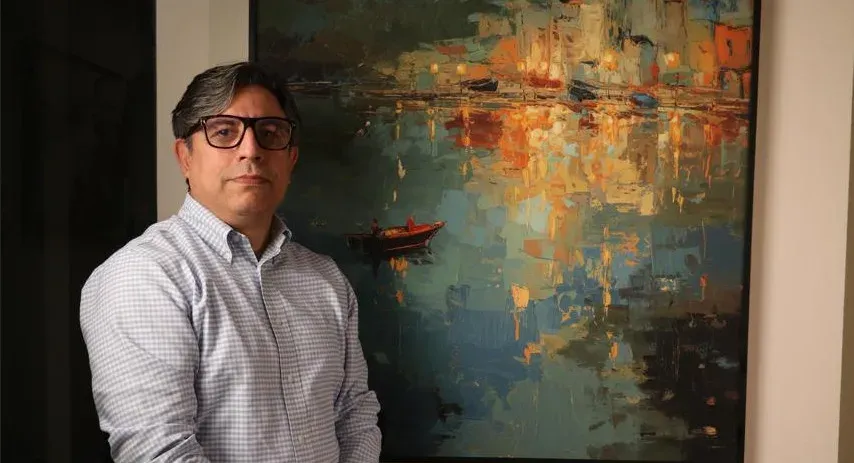 Artist collaborating with generative AI to create digital artwork.