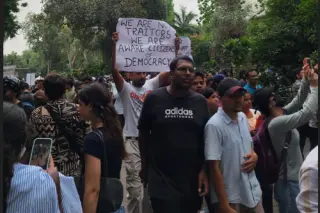 Students participate in protests demanding reforms to India's examination system following the NEET paper leak controversy.