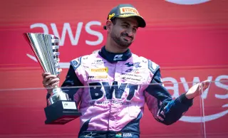 Kush Maini celebrates his second-place finish during the FIA Formula 2 Feature Race at the Hungaroring.